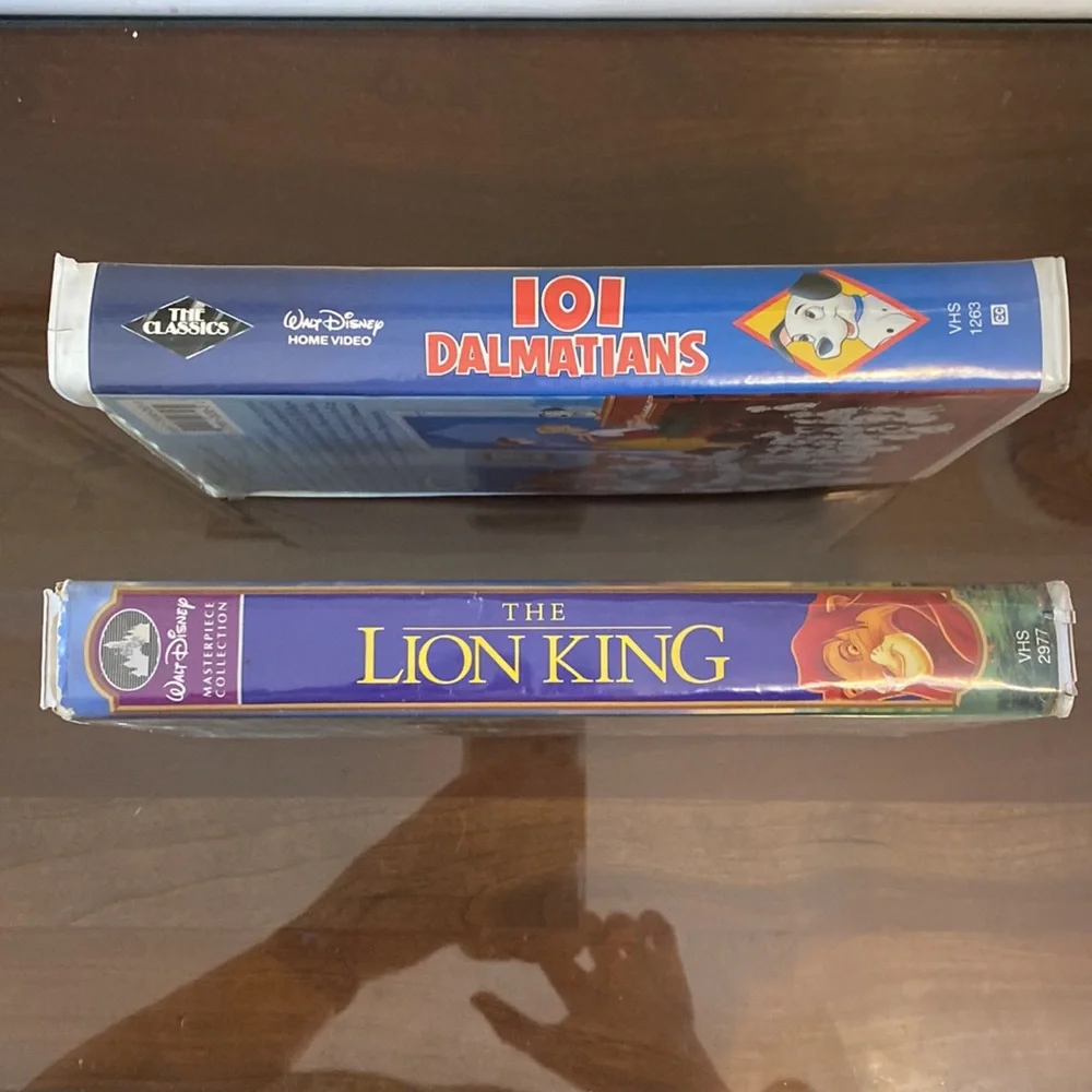 The Lion King VHS and 101 Dalmatians VHS